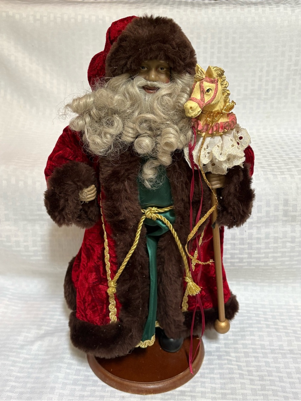 Festive Red and Brown Santa Figurine with Gold Carousel Horse